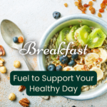A bowl of oatmeal topped with kiwi, banana slices, blueberries, and nuts sits next to a spoon and scattered nuts. Text reads: “Breakfast. Fuel to Support Your Healthy Day.”.