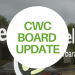 A glass door with "Cancer Wellness Center" written on it, partly visible. Overlaid in the center is a white circle with green text that reads, "CWC BOARD UPDATE.
