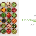 Several small bowls filled with a variety of colorful fruits and vegetables arranged in a grid next to text that reads, "National Nutrition Month with Oncology Dietitian Lori Bumbaco.