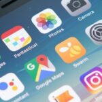 A smartphone screen displays various app icons, including Messages, Photos, Camera, Settings, Google Maps, Instagram, Messenger, and Telegram, with the time showing 15:47.